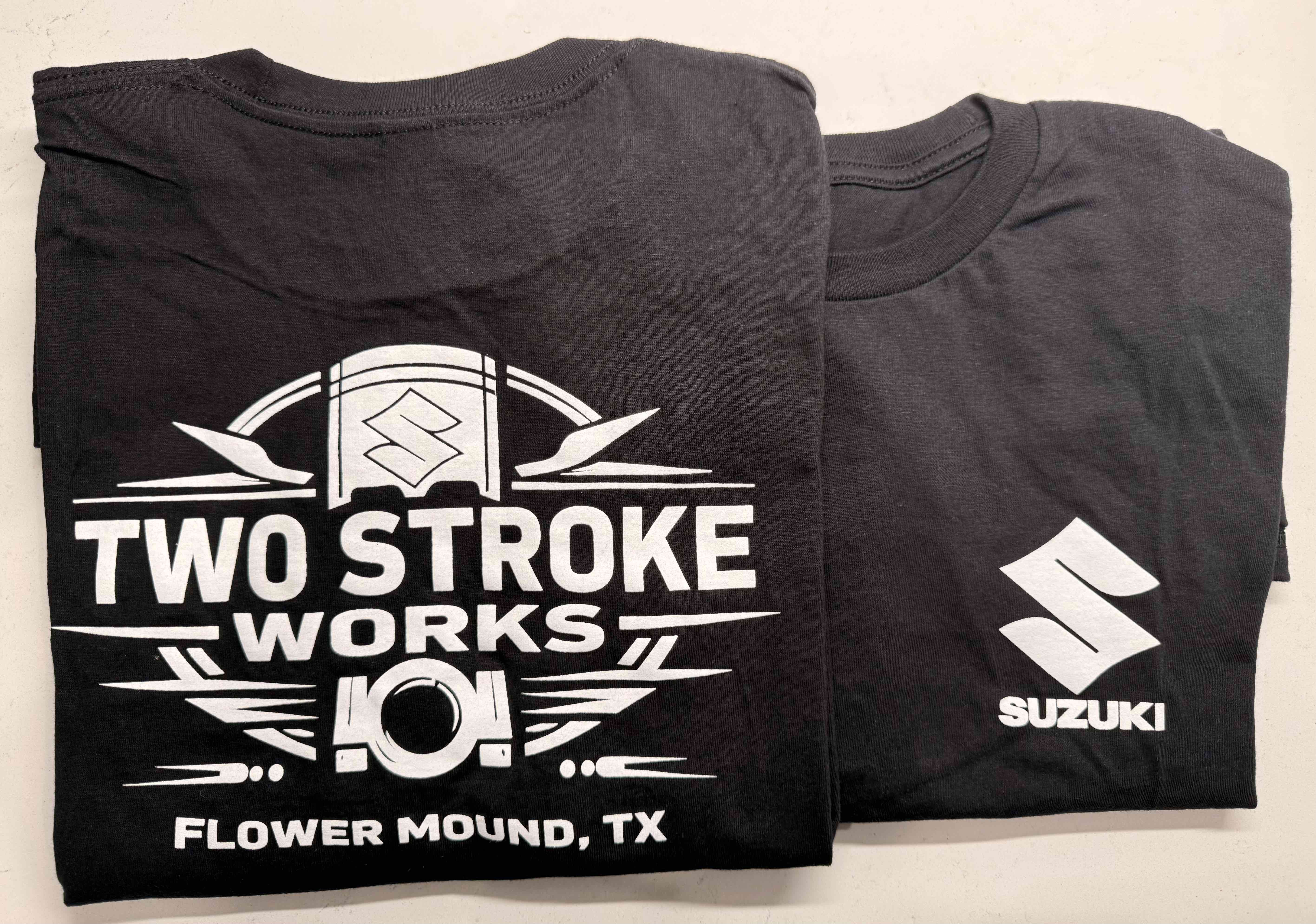 Two Stroke Works shirts and shop goods